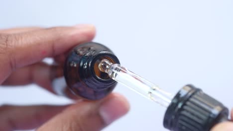 applying liquid with dropper