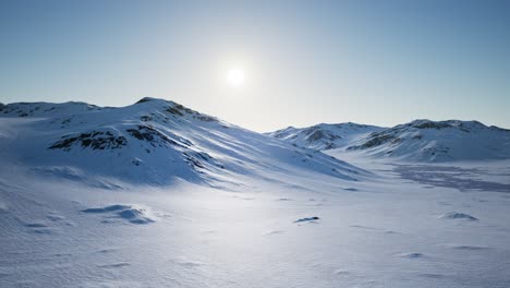 Aerial-Landscape-of-snowy-mountains-and-icy-shores-in-Antarctica