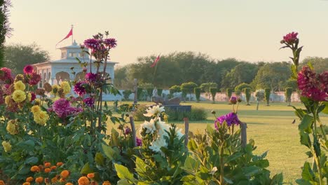 spritual place surrounded by beautiful flower garden with lots of multicolor flower