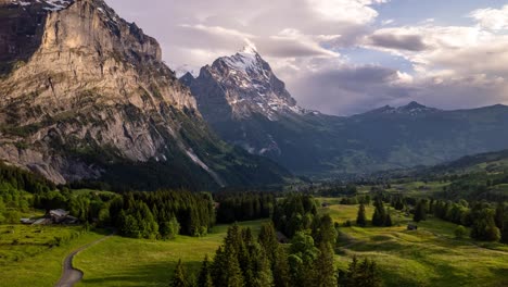 Stunning-Hyperlapse-of-incoming-cumulonimbus-clouds-over-picturesque-mountain-town-in-Swiss-Alps