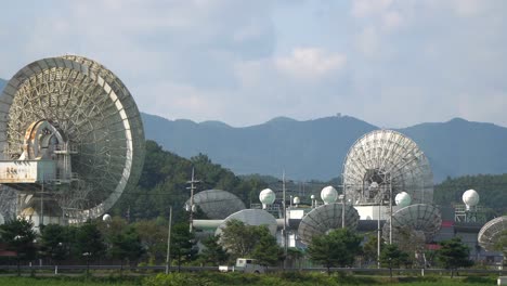 Geumsan-KT-SAT---Kumsan-Satellite-Center-At-Daytime-With-Mountain-Views-In-The-Background-In-Kumsan,-South-Korea