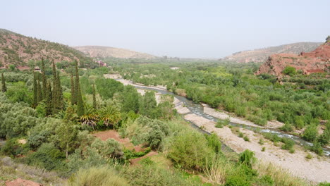 landscape with vegetation and stream in sunny day, morocco