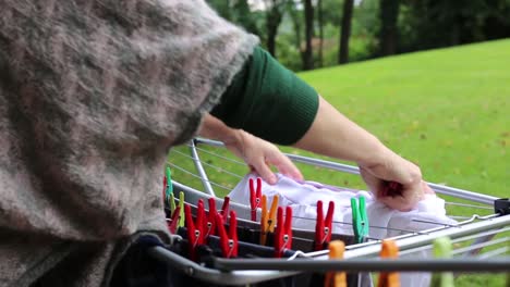 close-up-of-spreading-laundry-out-to-dry