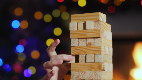 board game for training accuracy - pull out a wooden block from the tower