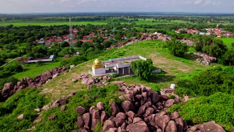 Sri rama Temple with in foreground nountiled houses yelupugonda village, Tekmal, telangana, india. day time, push back, tilt up, drone shot, 4k.