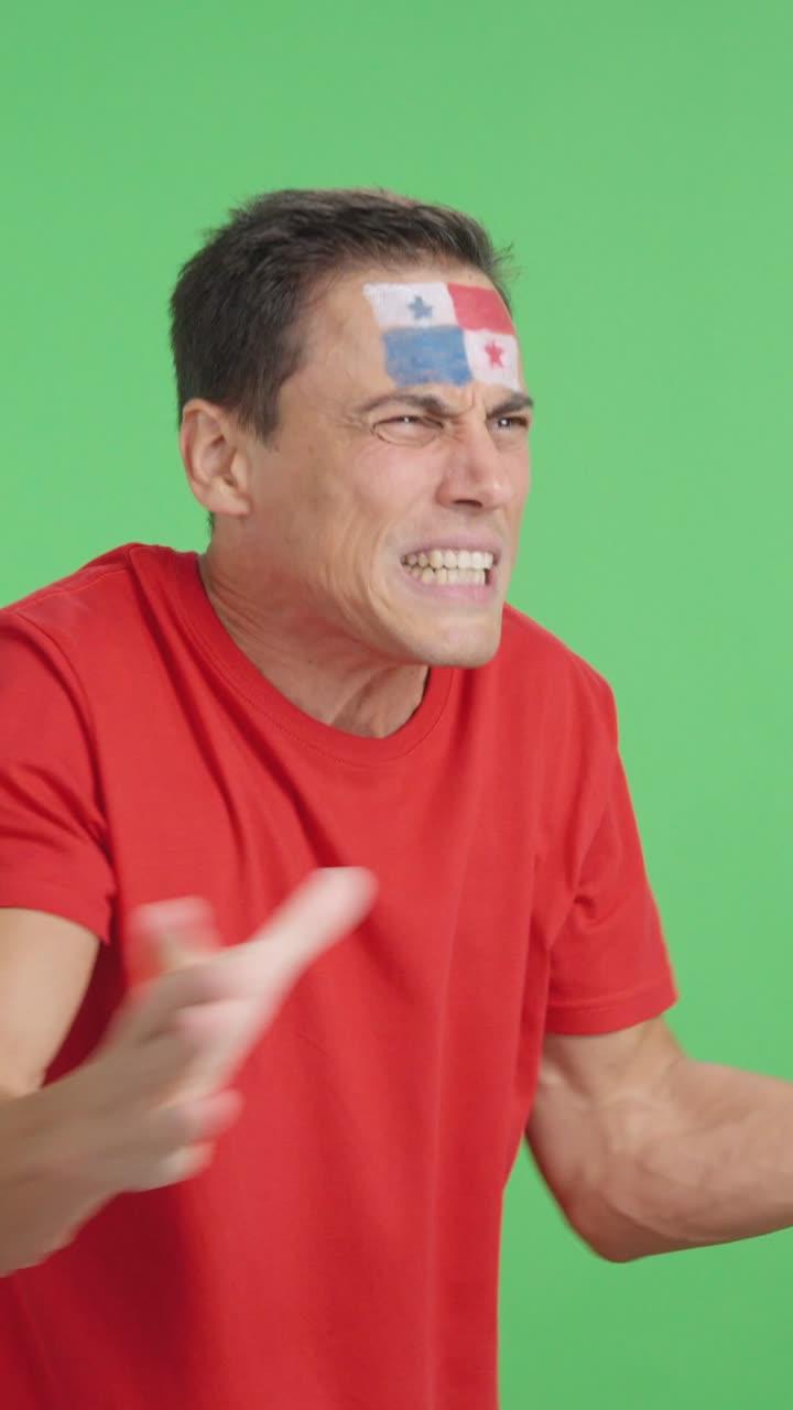 Man cheering for Panama, angry with the decision of referee