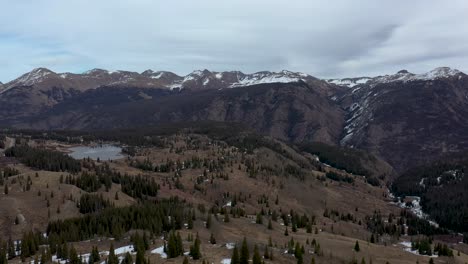 lake 4k aerial rocky mountains
