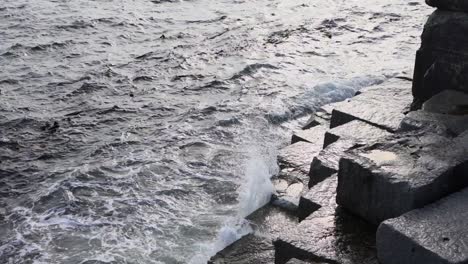 water splashing the rocks at ogden point breakwater