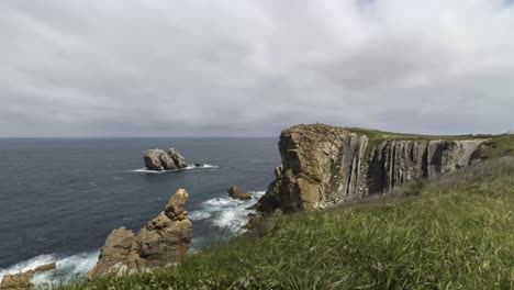 cliffs and sea against sundown sky