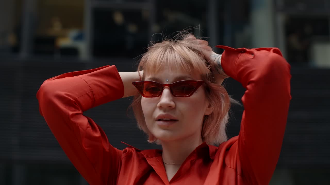 Woman in Red Shirt and Sunglasses