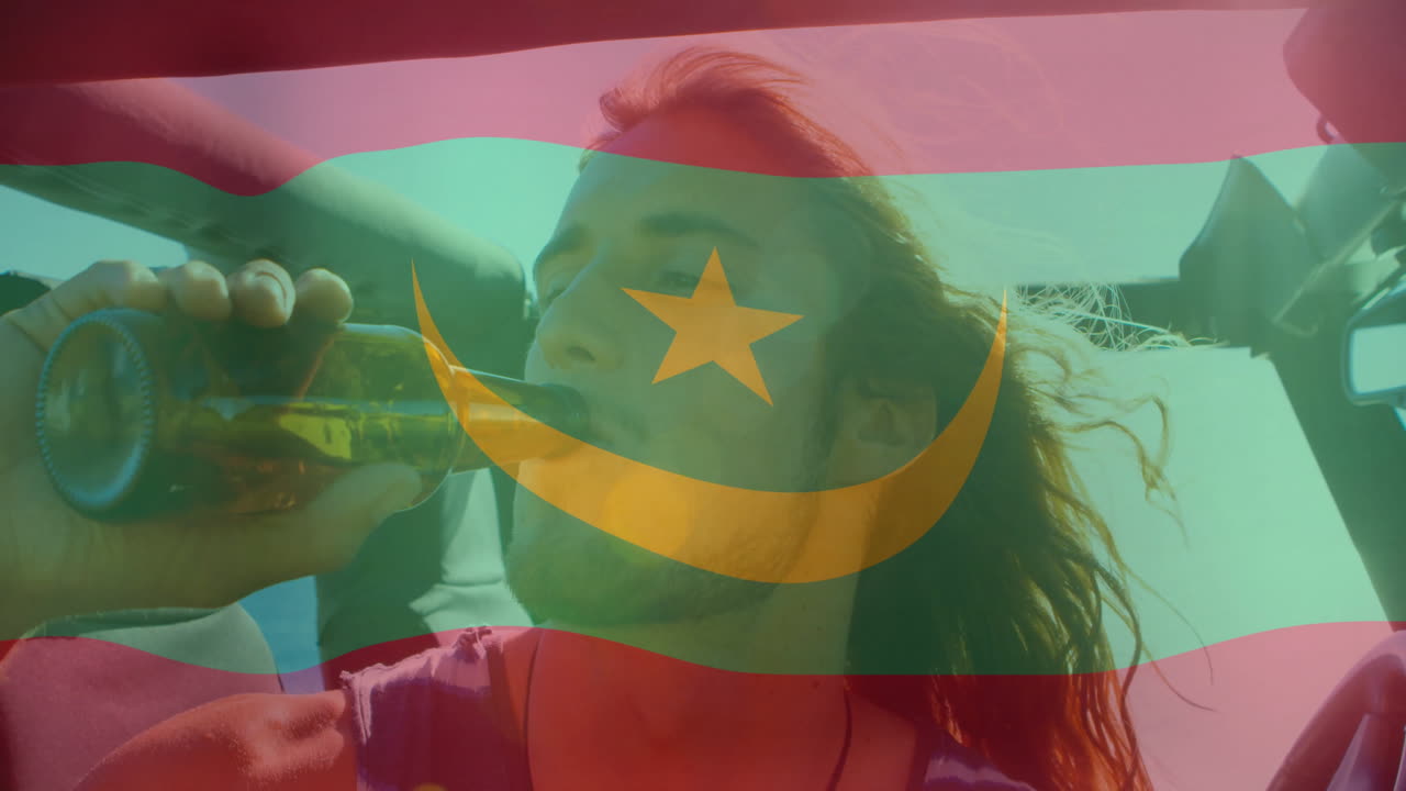 Drinking from bottle, person in front of Mauritania flag with star and crescent