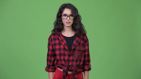 young beautiful businesswoman pointing at camera