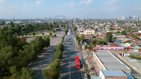 Aerial-Drone-Fly-Above-Chilean-Streets-of-Santiago,-Avenue,-City-neighborhood,-urban-park-of-Lo-Prado-station