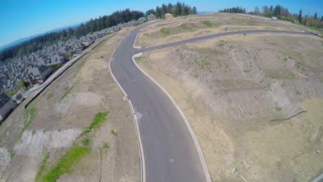 an aerial image over a modern housing development representing suburban sprawl