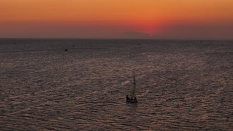 sunset sailing over mui ne bay, vietnam