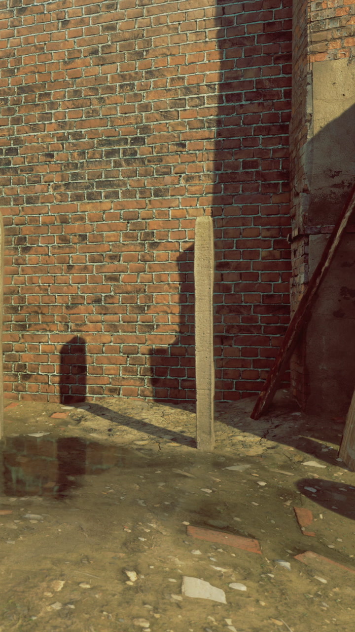 Construction site with brick wall and standing pole in urban area
