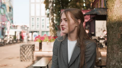 teenage girl talking outdoors