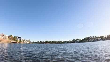 time-lapse view of a lake with changing sunlight