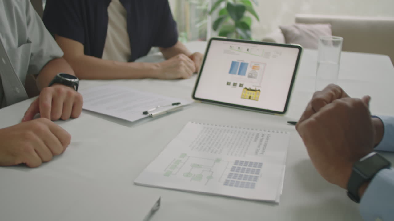 Married Couple Shaking Hands and Talking with Sales Representative