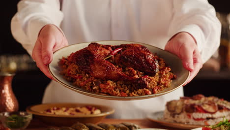 chef presenting a delicious middle eastern dish