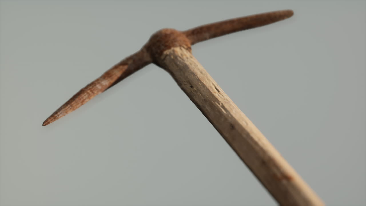 Close up of an old rusted pickaxe head