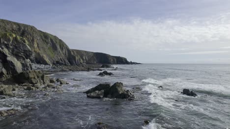 drone flying along rocky irishsouth east coastline copper coast waterford epic locations