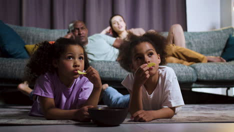 family watching film at home