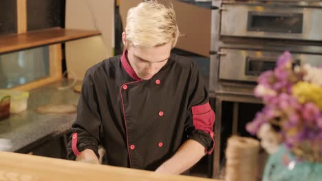 chef preparing food in a restaurant kitchen