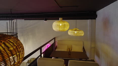 cozy cafe interior with wicker lamps