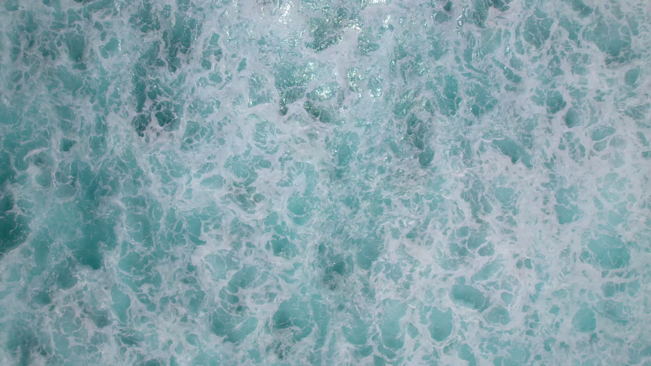 Coming down on Pacific Ocean waves crashing on the North Shore of Oahu Hawaii