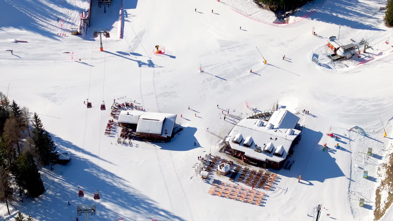Aerial drone view of a ski resort in Piani di Pezze, Alleghe, Province of Belluno, in the Dolomites, Italy in daylight
