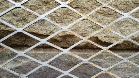 sandstone bricks slow motion slide with barbecue steel grill texture pattern