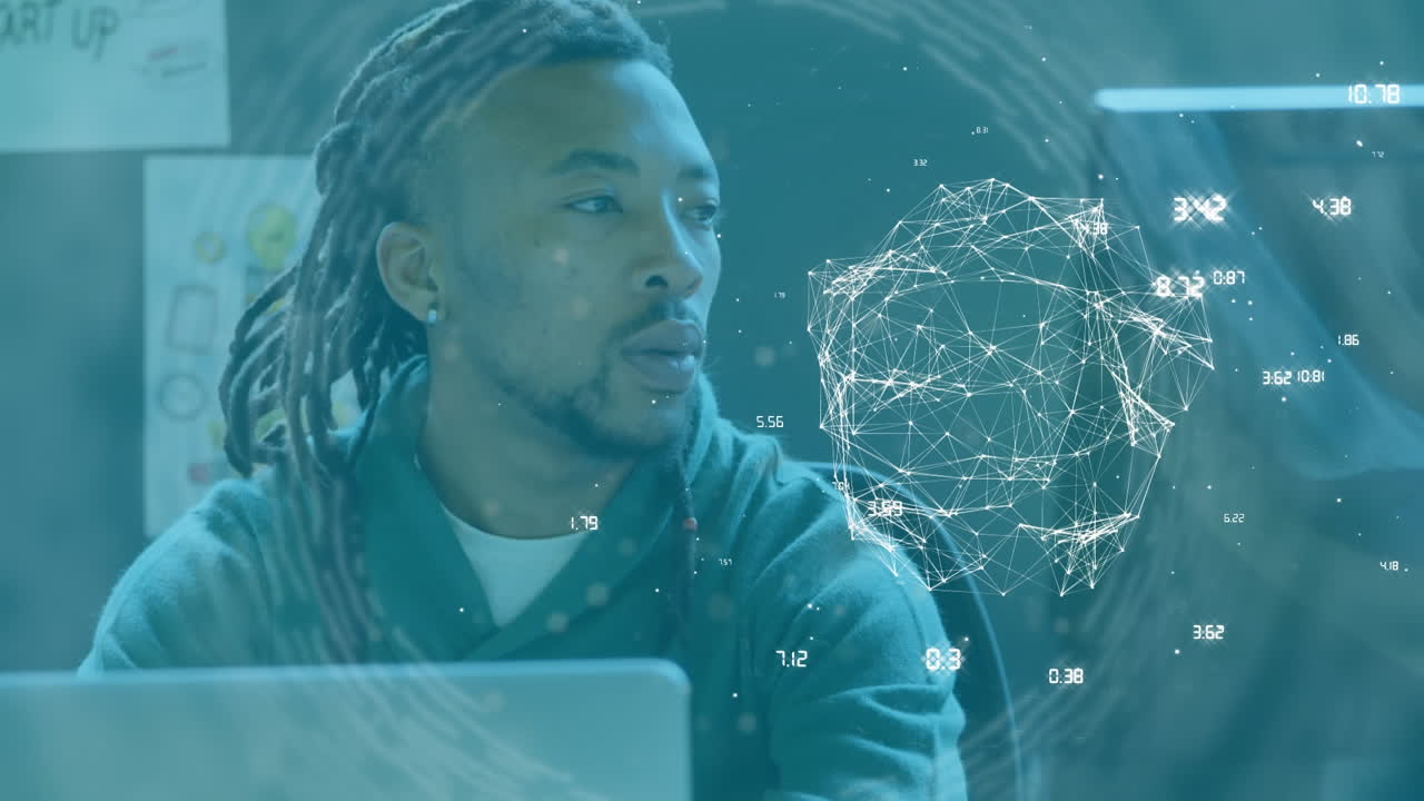 Animation of network of connections over businessman at desk using computer