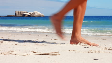 man walking on the beach