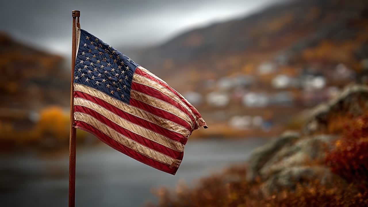 A Majestic American Flag Waves Gracefully Amidst a Colorful Autumn Landscape, Capturing the Essence of Freedom and National Pride in Nature's Serenity