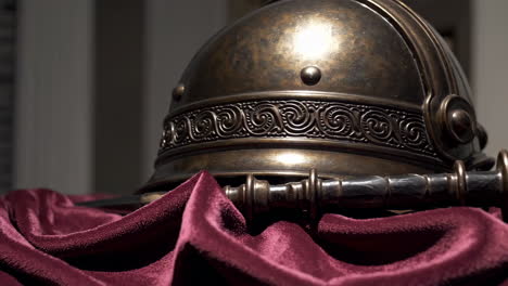 ancient roman helmet and sword display