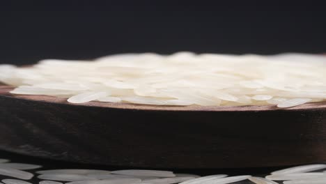 close-up of white rice in a wooden bowl