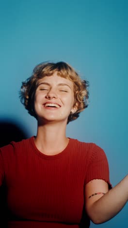 woman celebrating with sparklers and flag