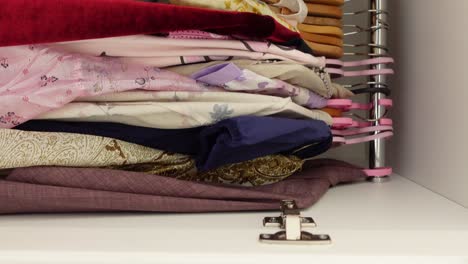 organized closet with assorted women's clothing