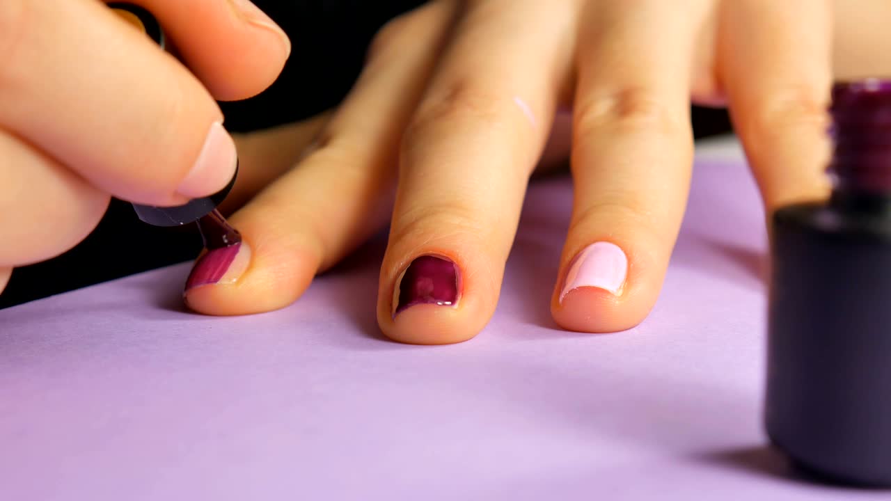 Step of professional gel polish manicure closeup footage. Beauty industry.