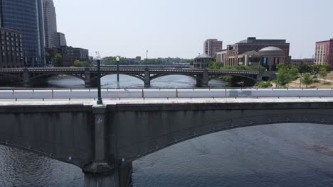 Gillett-Bridge-over-the-Grand-River,-Grand-Rapids,-Michigan,-USA,-aerial-view