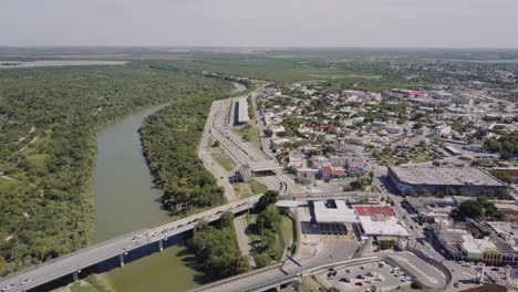 aerial - international bridge, united states-mexico border, wide shot