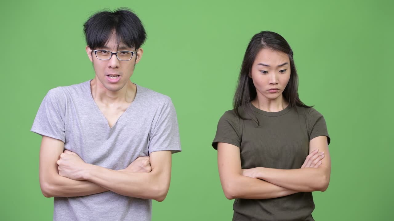 Young Asian couple getting angry together