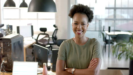 confident african american businesswoman stands in a business office
