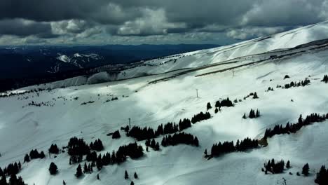 us, oregon, mt hood, meadows ski area, 2025-04-22 - drone view of mt hood at the mt hood meadows ski area in spring. flying across the ski runs and lifts towards timberline.