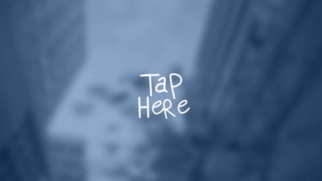 animation of tap here text over blurred background