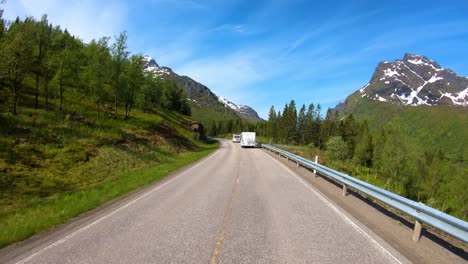 vehicle point-of-view driving a car vr caravan travels on the highway. tourism vacation and traveling. beautiful nature norway natural landscape.