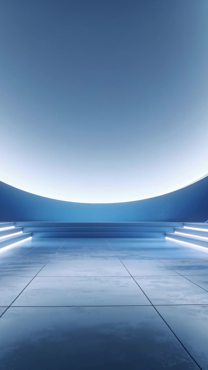 Vertical video: Pulling back camera revealing empty stage in studio, lit backdrop and LED stairs