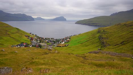 panorama of koltur island from kvivik village on valley landscape in faroe islands