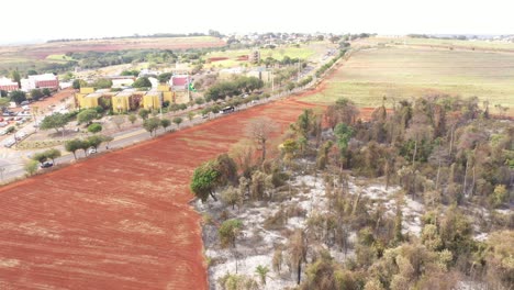 city and burnt vegetation in campinas, sao paulo, drone shot